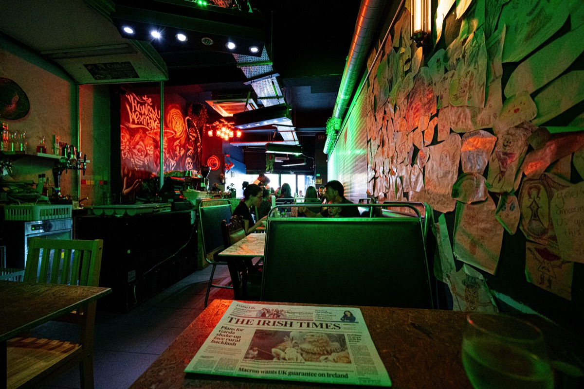 A PHOTOGRAPH OF A NEWSPAPER IN A RESTAURANT