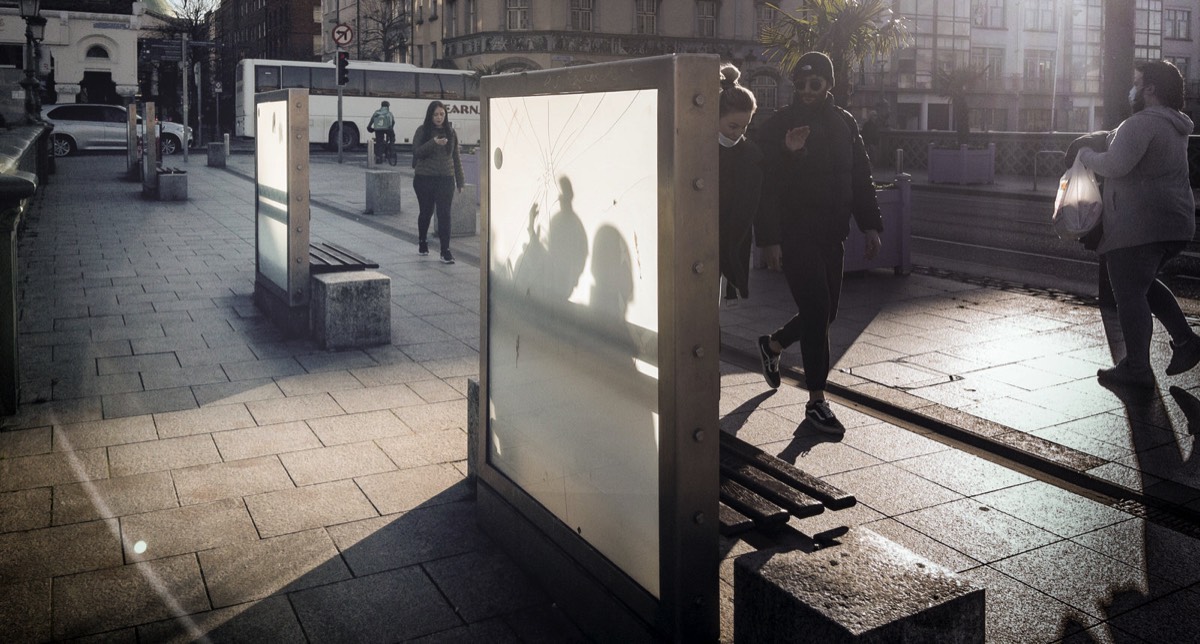 PROJECTED IMAGES NEAR SUNLIGHT CHAMBERS PHOTOGRAPHED WHILE CROSSING GRATTAN BRIDGE 