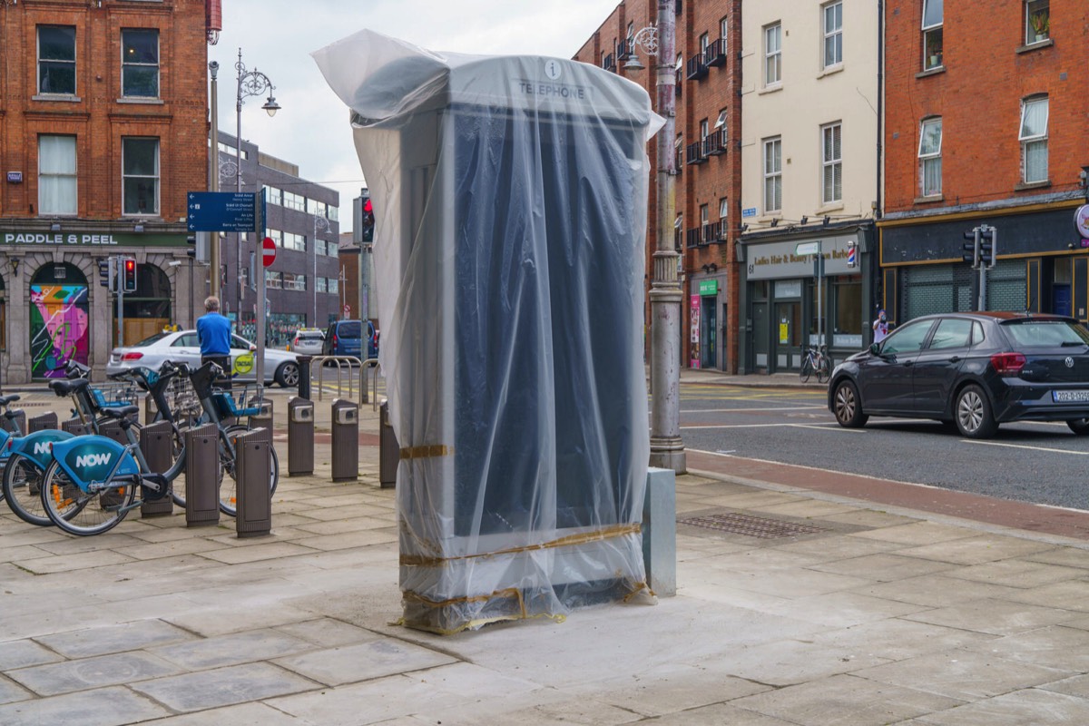 WAITING FOR PHONE KIOSK TO BE UNWRAPPED 001
