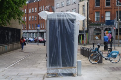 WAITING FOR PHONE KIOSK TO BE UNWRAPPED 