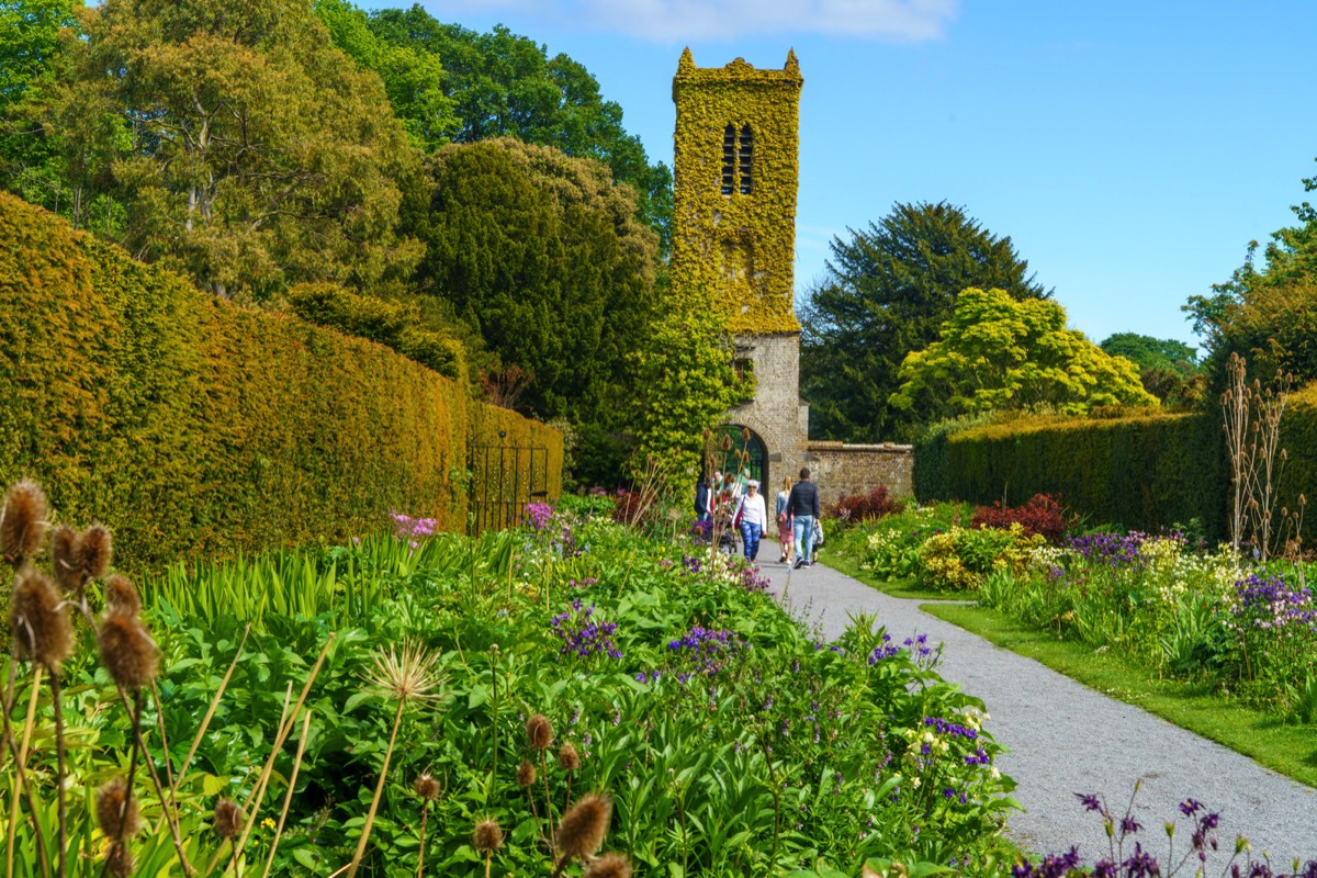 THE CLOCK TOWER IN THE WALLED GARDEN AT SAINT ANNE