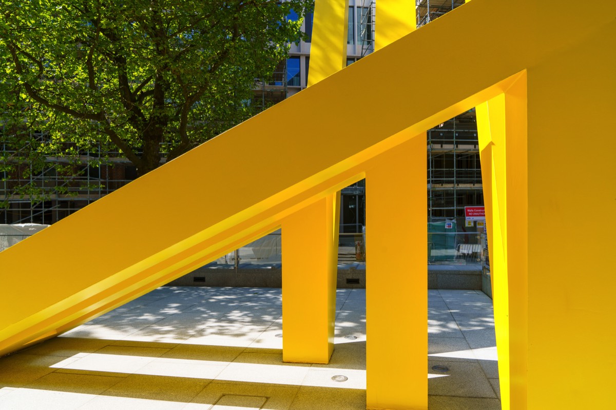 A YELLOW METAL THING BY MICHAEL BULFIN - YELLOW STEEL GEOMETRIC REFLECTIONS  004