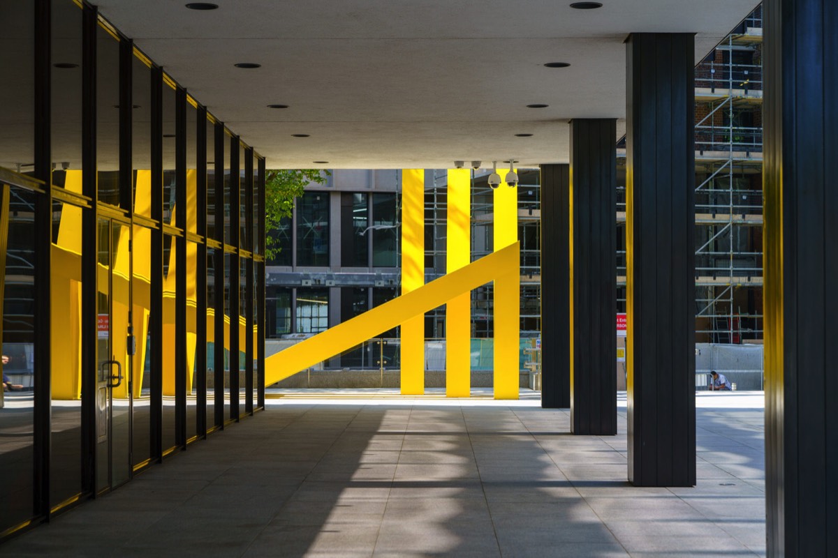 A YELLOW METAL THING BY MICHAEL BULFIN - YELLOW STEEL GEOMETRIC REFLECTIONS  007