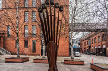 In the early 1900's, Belfast machinery manufacturers Mackies persuaded Sir Otto Jaffe, a prominent local businessman who also owned a brickworks on the river Lagan embankment, to build a large spinning mill on the Newtownards Road  